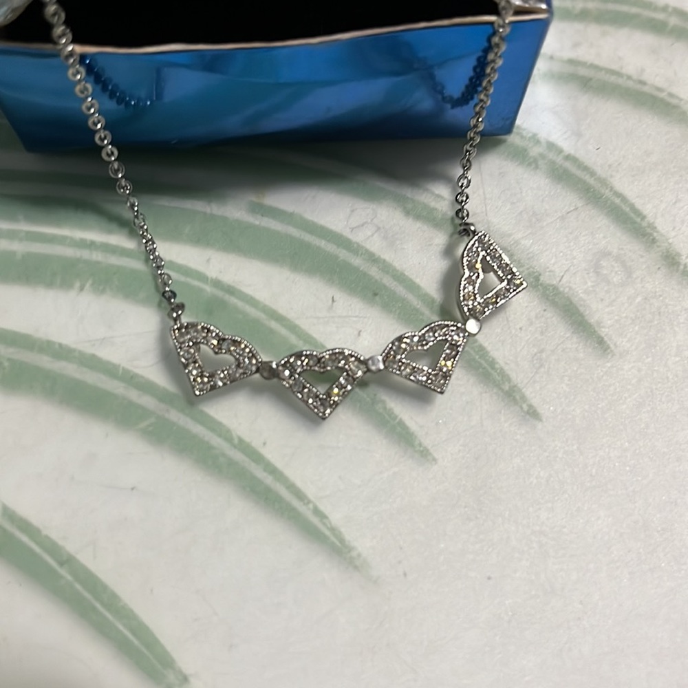 Silvertone convertible necklace.